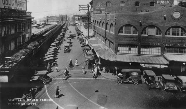 With construction complete, the configuration of the Market looks much like it does today. A branch of the Seattle Public Library opens on the lower floor.